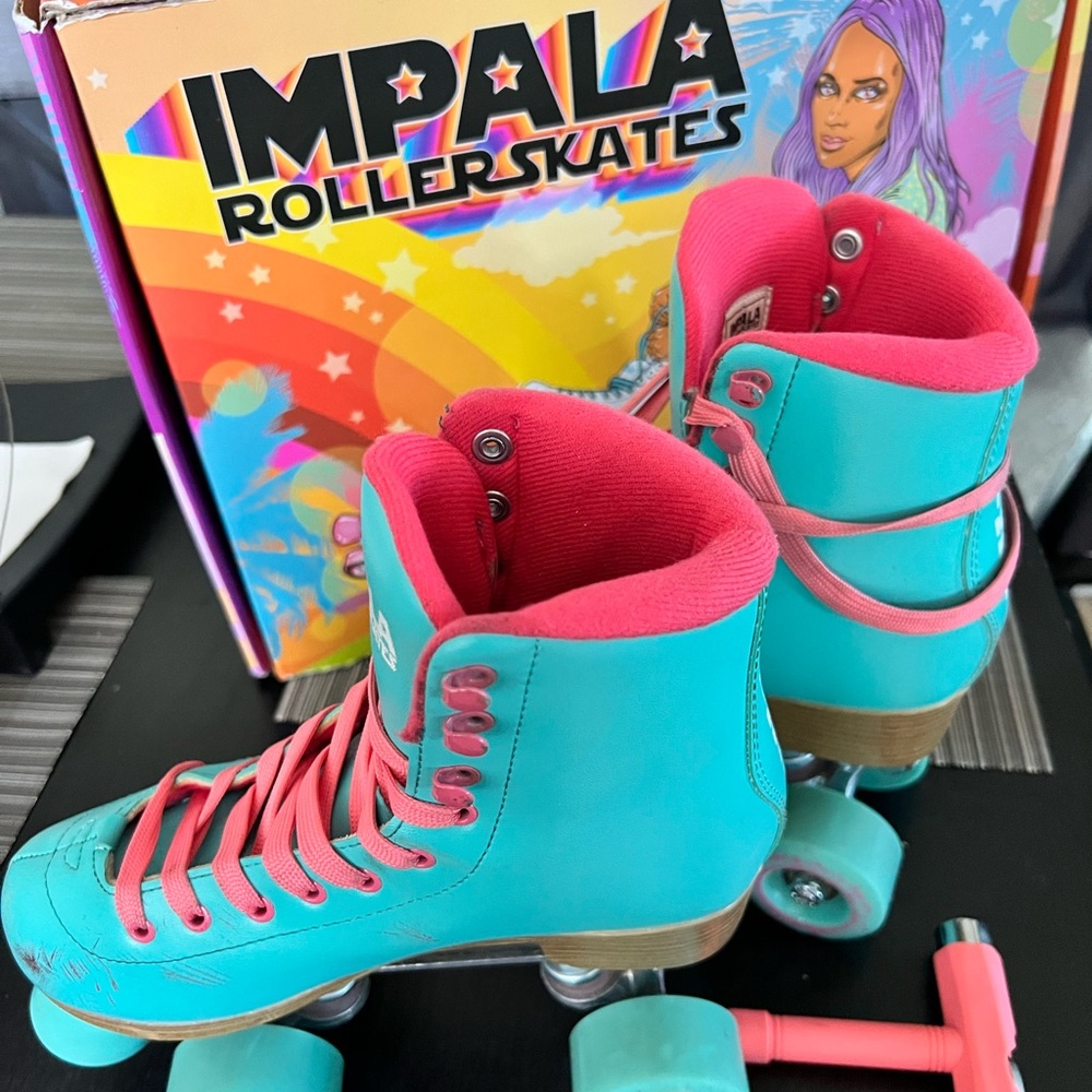 Blue and Pink Retro Roller Skates with High-Top Design